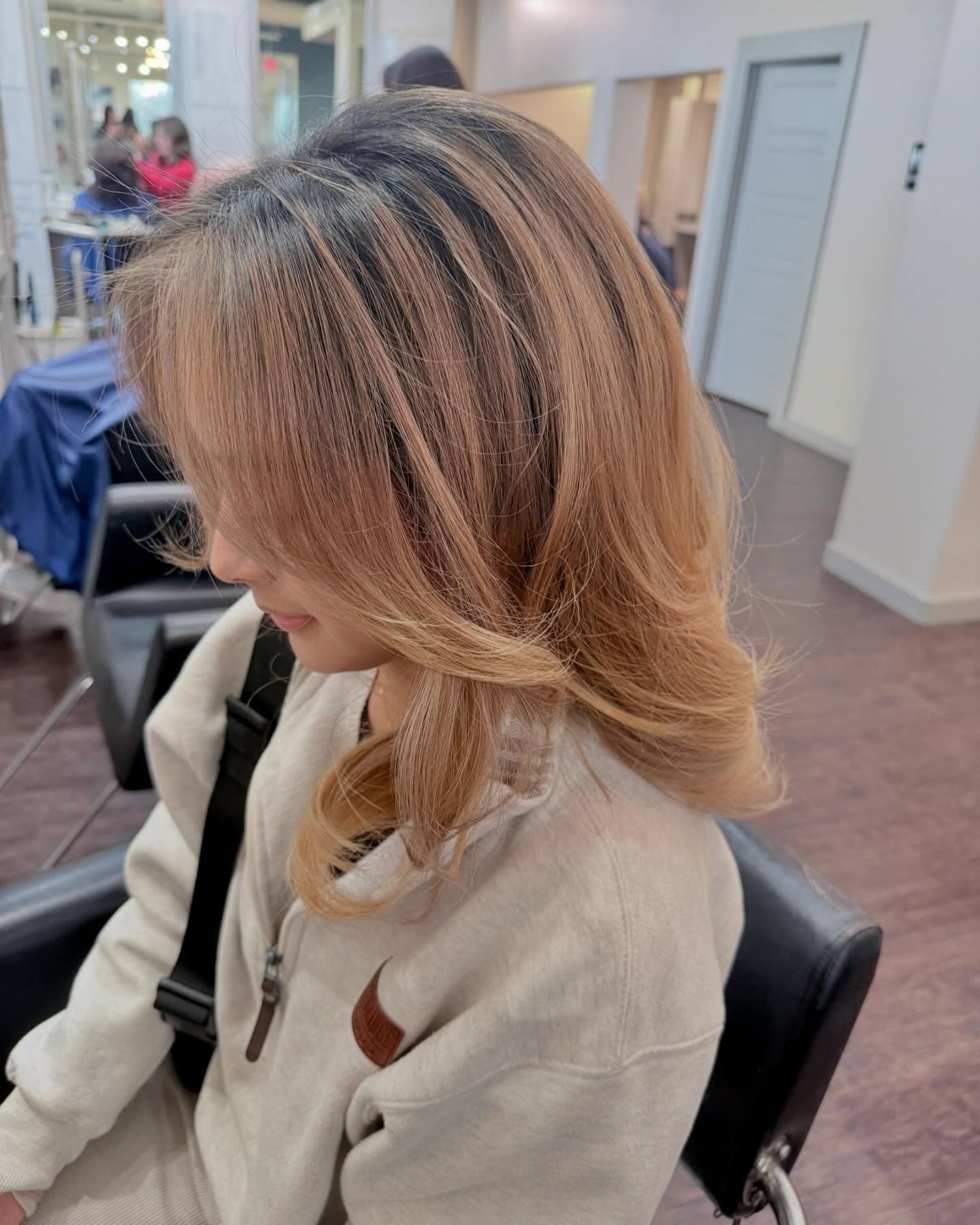Hair toner application at Lee Graves Salon in Plano, TX