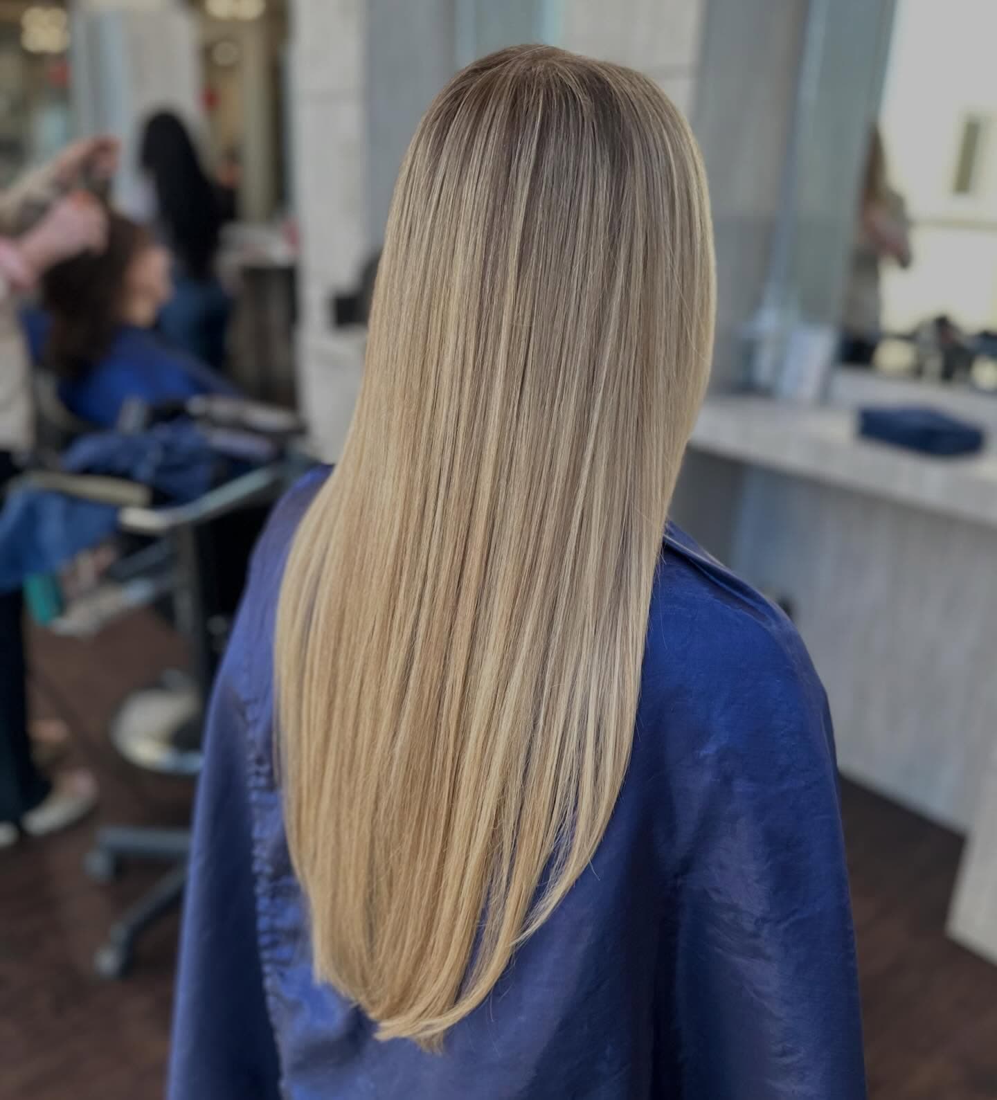 Smooth, frizz-free straight hair after a keratin treatment at Lee Graves Salon in Plano, TX