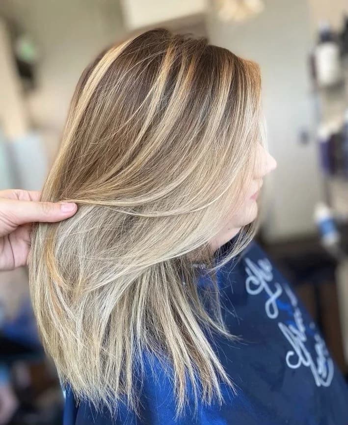 Professional blonde hair color result at Lee Graves Salon in Plano, TX