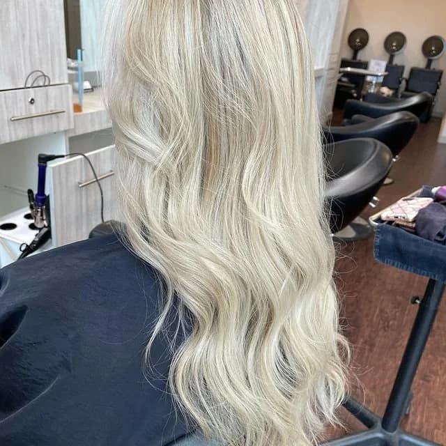 Bright, cool-toned platinum blonde hair with no brassiness at Lee Graves Salon in Plano, TX