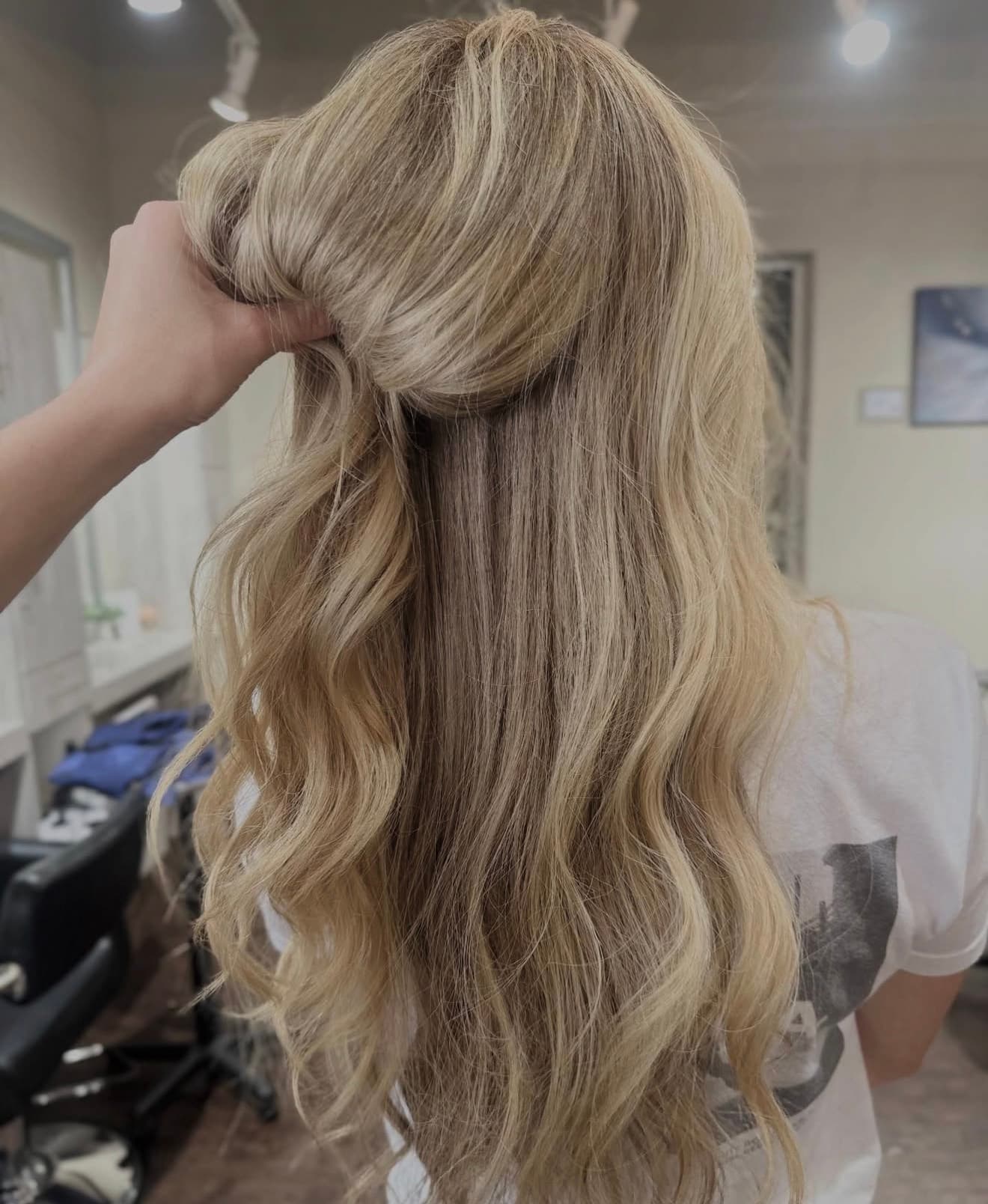 Hand-tied hair extension result for a Carrollton client at Lee Graves Salon