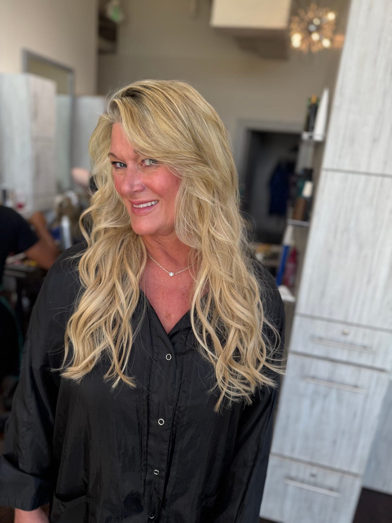 Soft, defined waves finished in-salon — the texture-enhancing alternative to pressing hair straight, at Lee Graves Salon